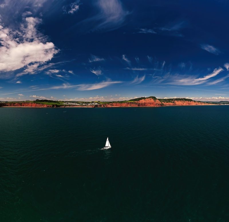 Abstract sea and boat graphic representing the journey of a video production project.